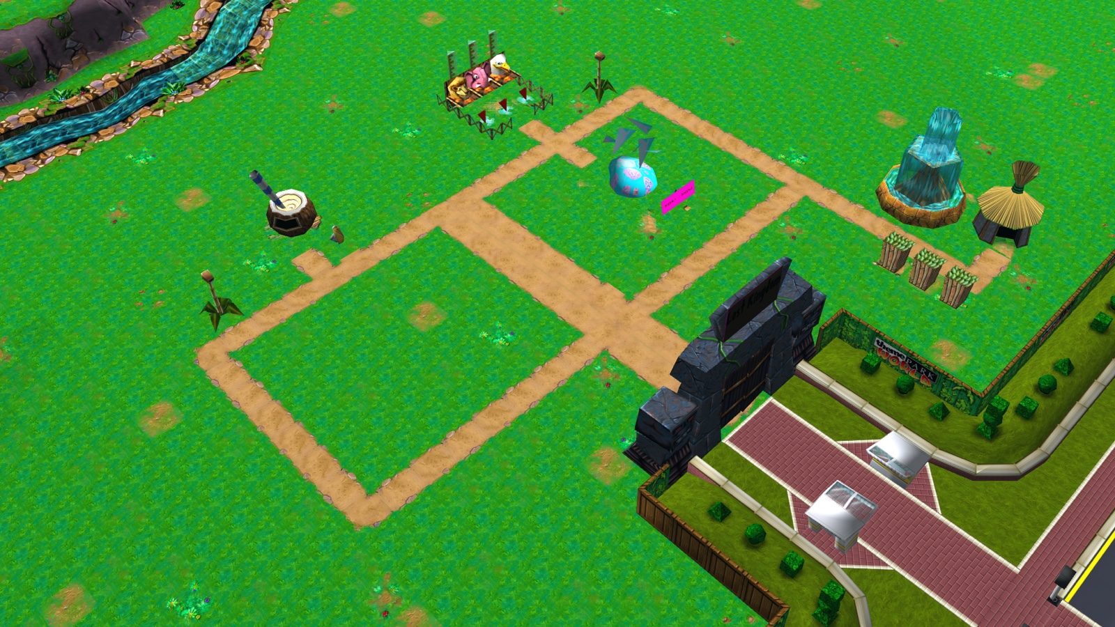 A starter park in the Lost Kingdom: paths, rides, a waterfall and the jungle entrance gate